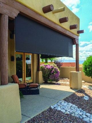 Patio shades with a cable guide